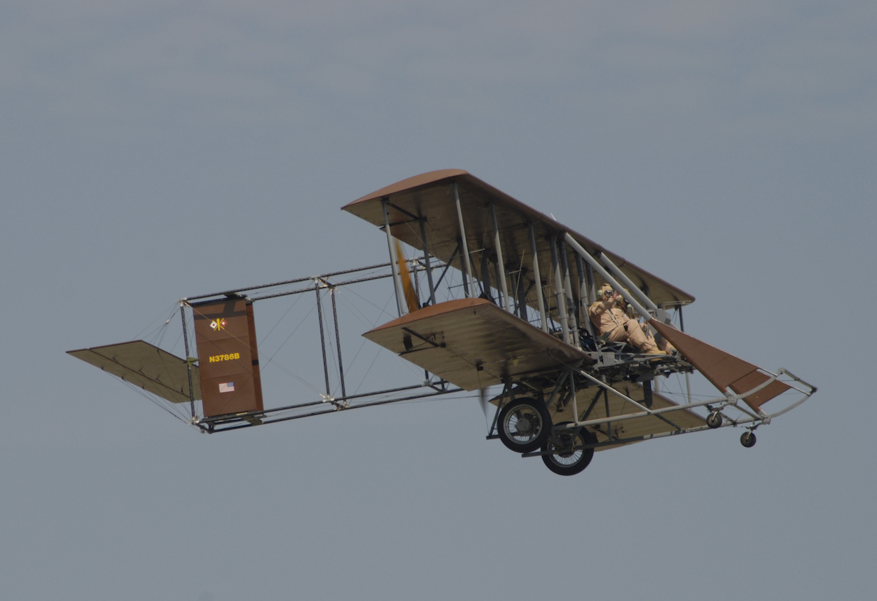 Brown Bird with Wright “B ” Flyer’s 1916 Model T Staff Car on static display at 2014 Vectren Dayton Air Sh ow. 