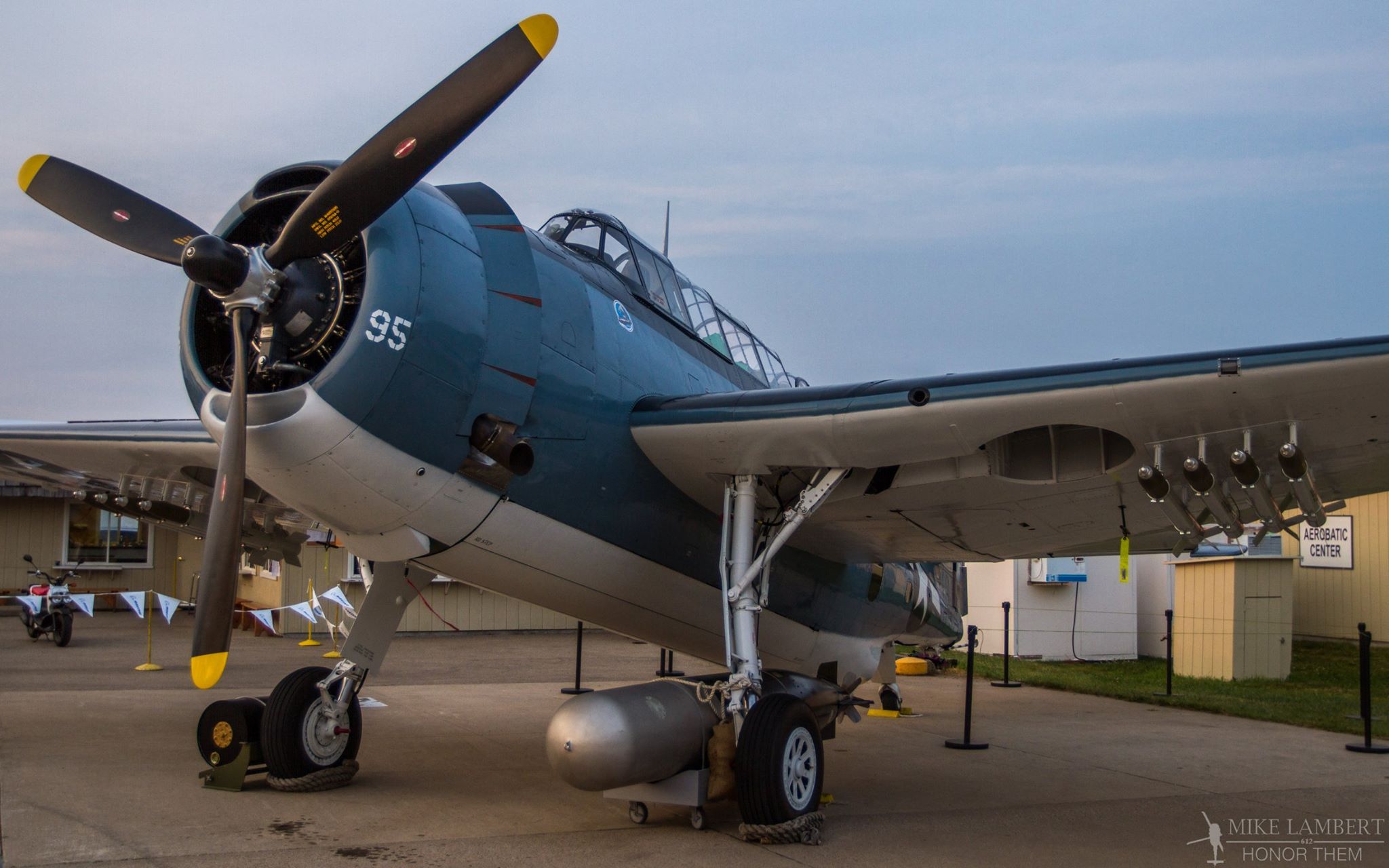 Lake Erie Warbirds' TBM-3E in the evening light at EAA AirVenture 2014. (photo by Mike Lambert) Photograph by Mike Lambert