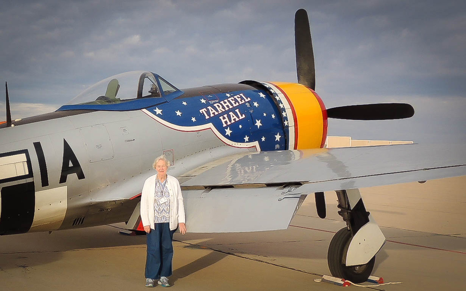 Victoria Thomson stands next to a P-47 Thunderbolt before an Air Force Heritage Flight demonstration on March 6, 2016 at Davis-Monthan Air Force Base, Ariz. Thomson’s father, Capt. Carl Ekstrom, was killed during World War II while piloting a P-47. After nearly seven decades, Thomson finally came face-to face with the Thunderbolt. (Courtesy photo)