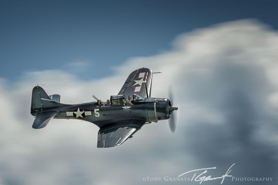 A stunning panning shot of the CAF Dixie Wing's SBD-5 Daunless at the 2012 WWII Weekend in Reading , PA ( Image by Tony Granata photographer) 