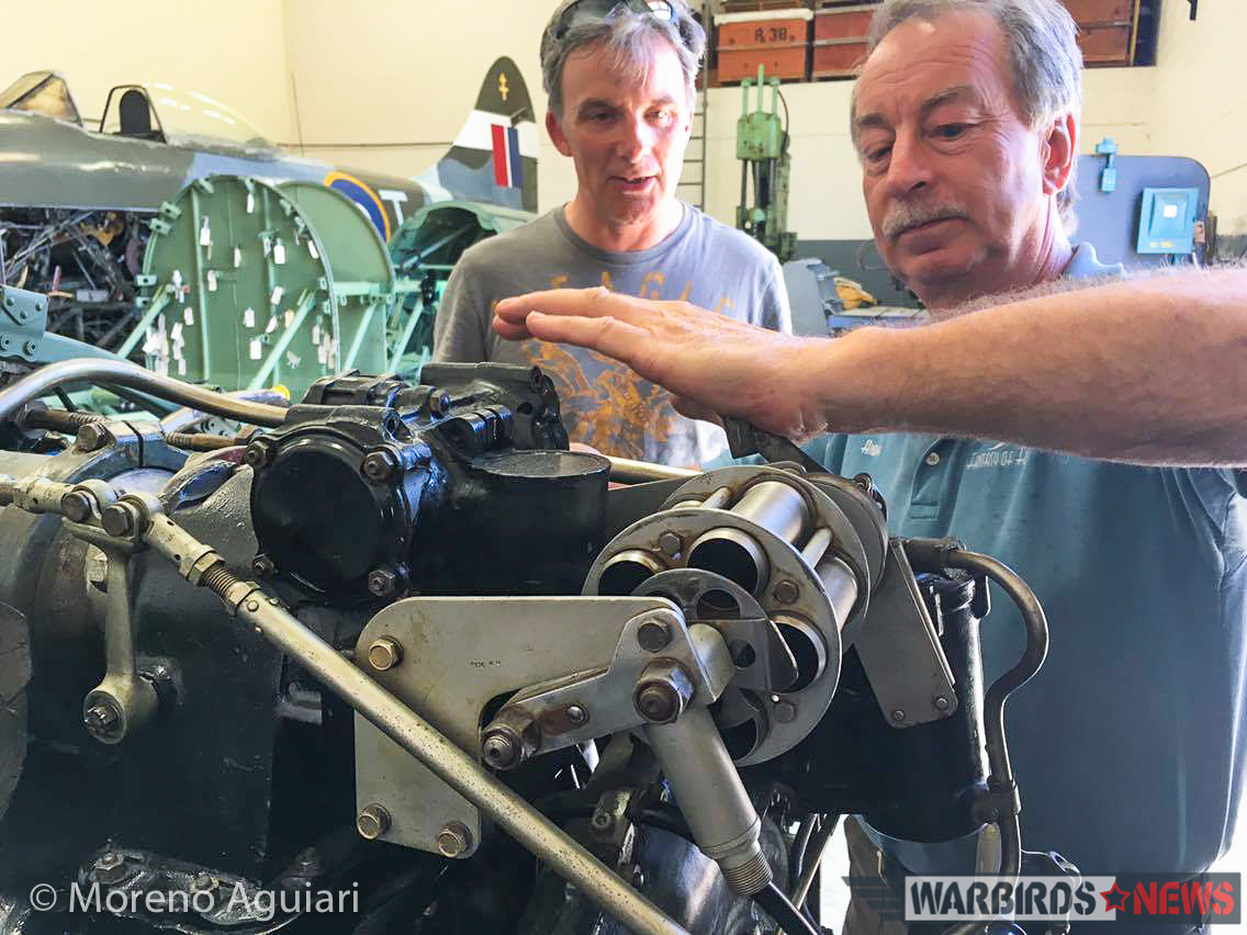 Andy Salter explaining the intricacies of the Sabre engine's Coffman starter, the four cartridge chambers of which can be seen beneath his hand. (photo by Moreno Aguiari)