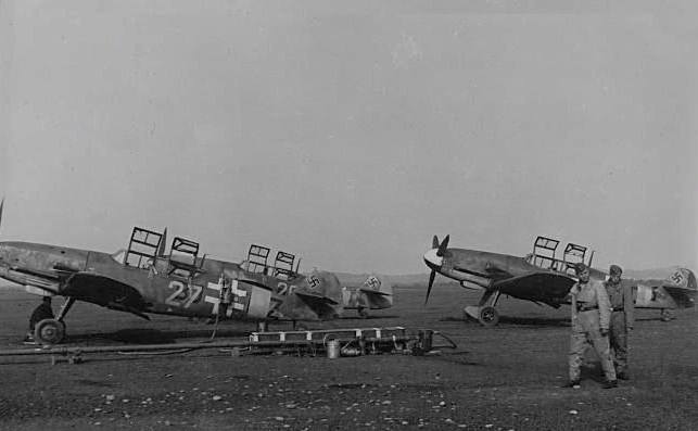 A wartime shot of Messerschmitt Bf 109 G-12s at a German airfield. Many thanks to reader Mark Eaton for sending in this shot! (Luftwaffe photo)