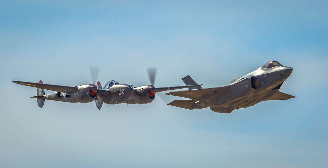 An F-38 Lightening and an F-35 Lightening II fly around the airspace of Davis-Monthan Air Force Base on March 4, 2016. The F-38 and the F-35 participated in Air Combat Command’s Heritage Flight Training Course, a program that features modern fighter/attack aircraft flying alongside Word War II, Korean War, and Vietnam War-era aircraft. (U.S. Air Force photo by Tech. Sgt. Brandon Shapiro)