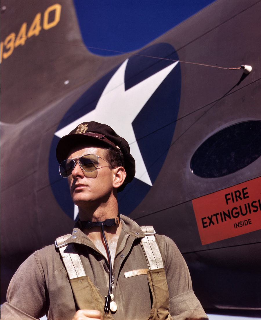 This October 1942 Palmer photograph shows a pilot assigned to the Douglas Aircraft Company, Long Beach, California. Note the dramatic upward gaze of the subject. I would guess that this pilot was a ferry pilot, delivering aircraft to the Army from the Douglas factory.