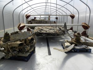 Citric acid solution released at timed intervals keeps the wings of the Dornier Do 17 moist and is slowly dissolving away the 70+ years of marine accretions. (image Credit: RAF Museum)