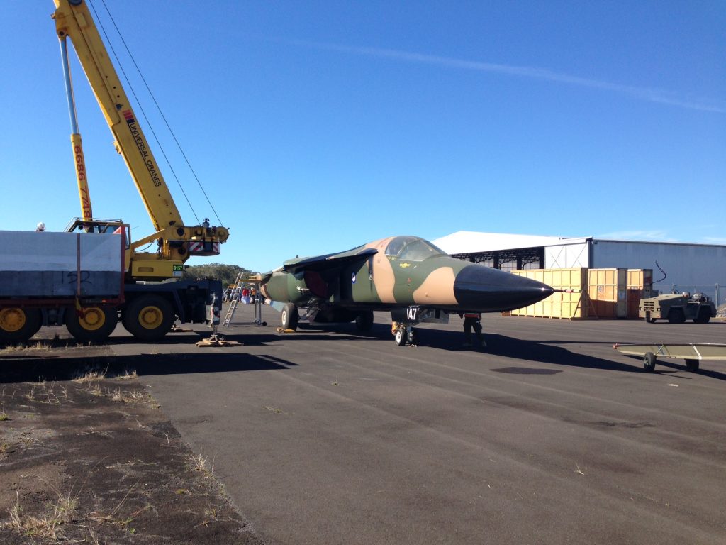 F-111C A8-147 offloaded after its overland arrival at the Evans Head Memorial Aerodrome. (Image Credit: EHMAHAA)