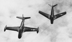 North American FJ-1 flying next to a swept-wing FJ-2 in 1952 shows the evolution in the design. (Image Credit: US Navy)