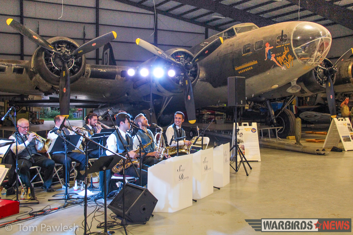 The band plays at the hangar dance with the B-17G 'The Movie Memphis Belle' in the background. (Photo by Tom Pawlesh)