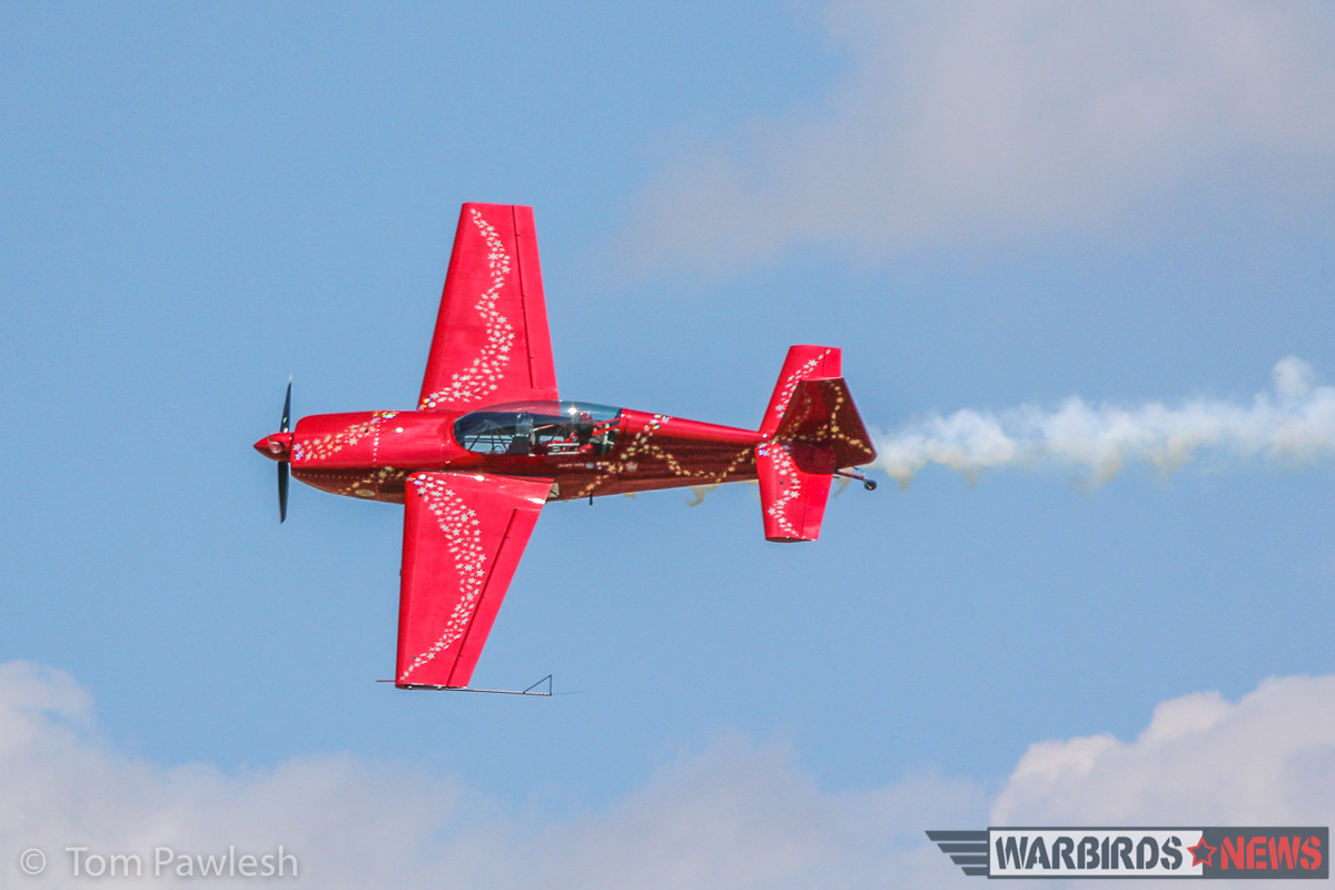 Jaquie B and her Extra 300. (Photo by Tom Pawlesh)