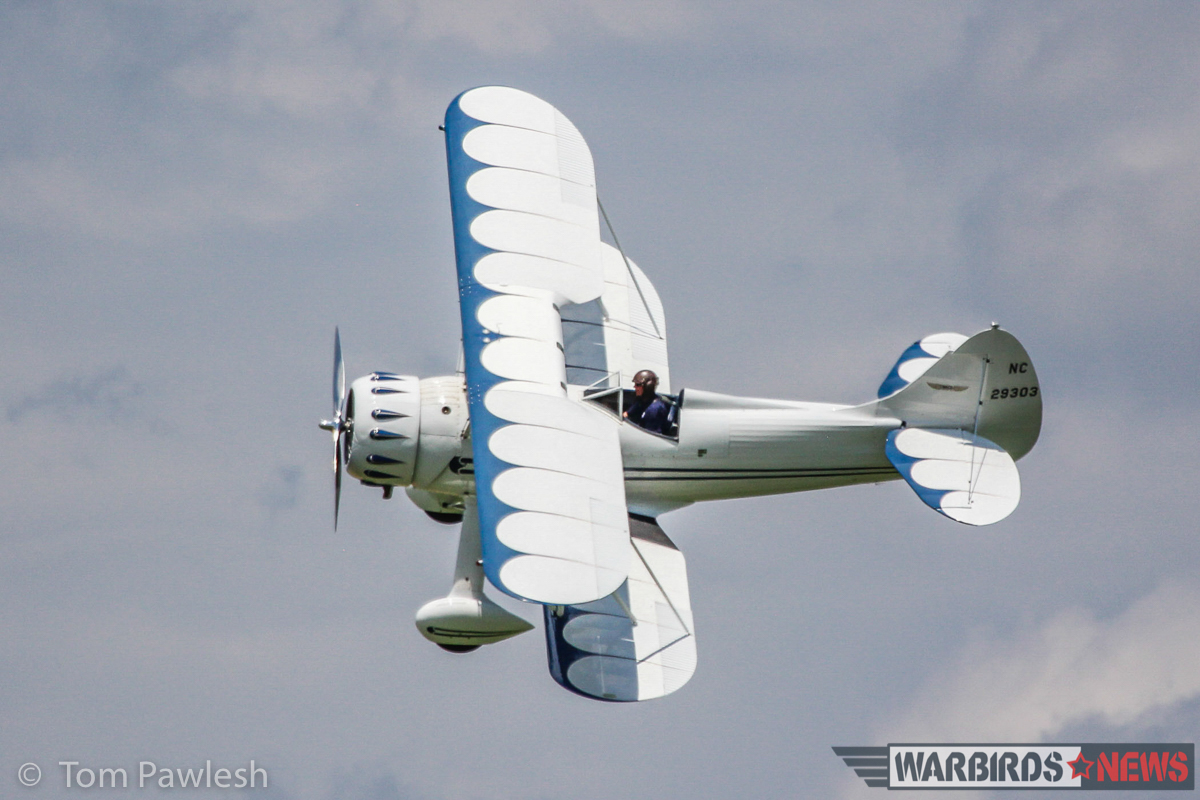 The gorgeous 1940 Waco UPF-7 makes a photo-pass. (Photo by Tom Pawlesh)