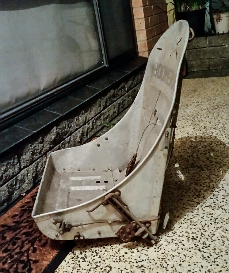 The unrestored pilot's seat for A46-3. (photo by Rick Anderson)