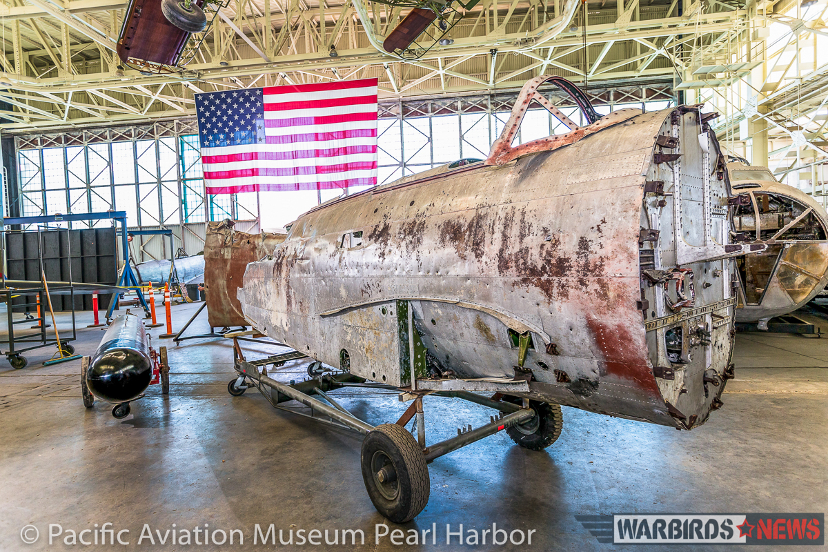 The freshly-unveiled forward fuselage of the unidentified Nakajima B5N2 'Kate' sitting on its cradle within the historic Hangar 79 at the Pacific Aviation Museum Pearl Harbor. (photo via Pacific Aviation Museum Pearl Harbor) 