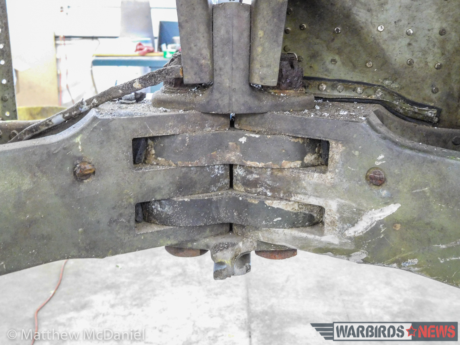 A close-up of the Helldiver's main spar center intersection. The thick metal stock used throughout the Curtiss' wing will allow a good portion of the original structure to be restored and made airworthy again, as surface corrosion can be removed with more than enough metal remaining to meet thickness and strength specifications required. (photo by Matthew McDaniel)