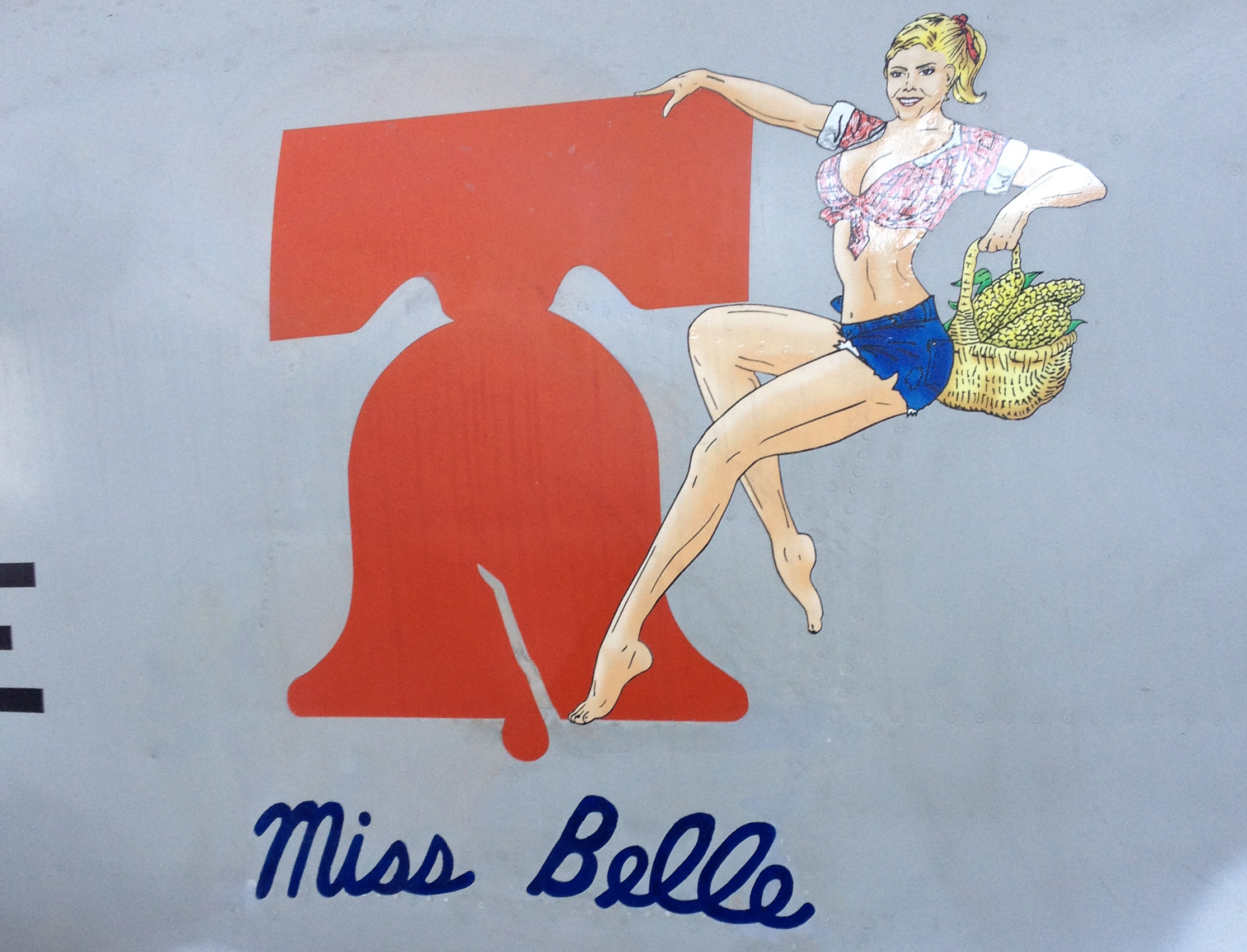 A closeup of the nose art, or more correctly nacelle art, for 'Miss Belle'. The name is authentic, although the Daisy Duke element is a more recent addition. (photo via Doug Goss)