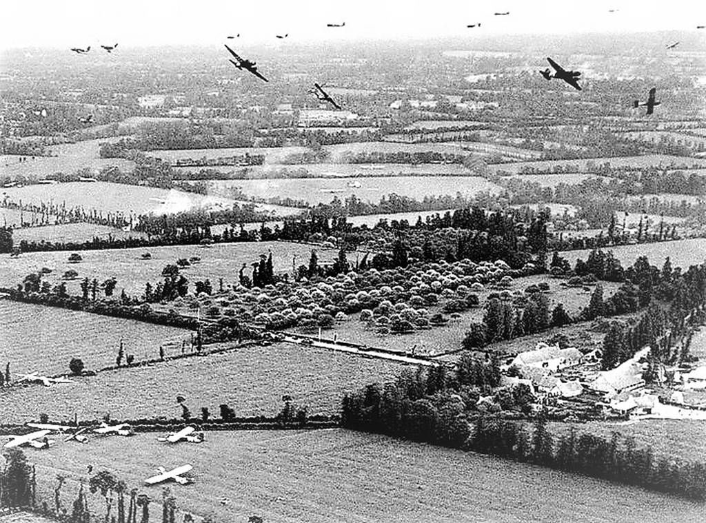 C-47 releasing gliders over Normandy. (Photo via Pete Mecca)