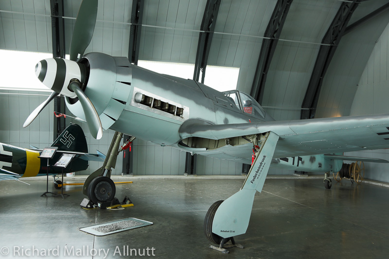 An airworthy Focke-Wulf 190D-9 replica in the original WWII Luftwaffe hangar once used at Cottbus in Germany. (photo by Richard Mallory Allnutt)