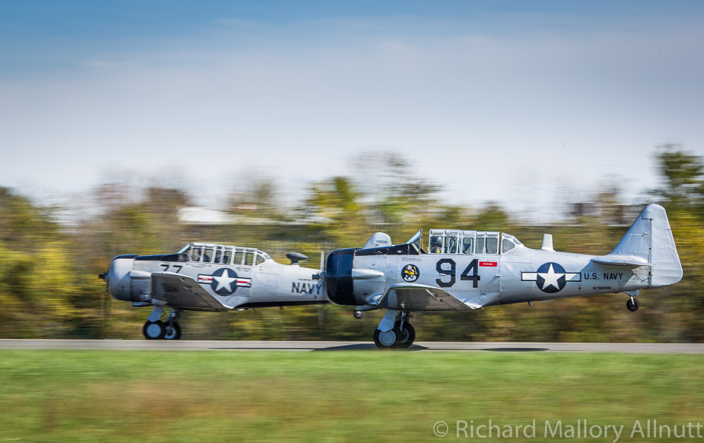 A pair of Texans taking off in formation. (photo by Richard Mallory Allnutt)