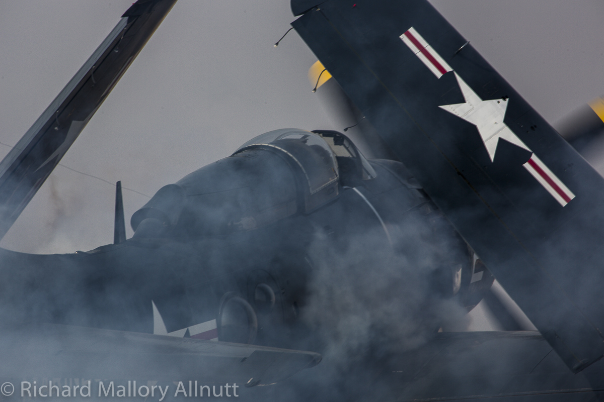 The Skyraider killing bugs... (photo by Richard Mallory Allnutt)