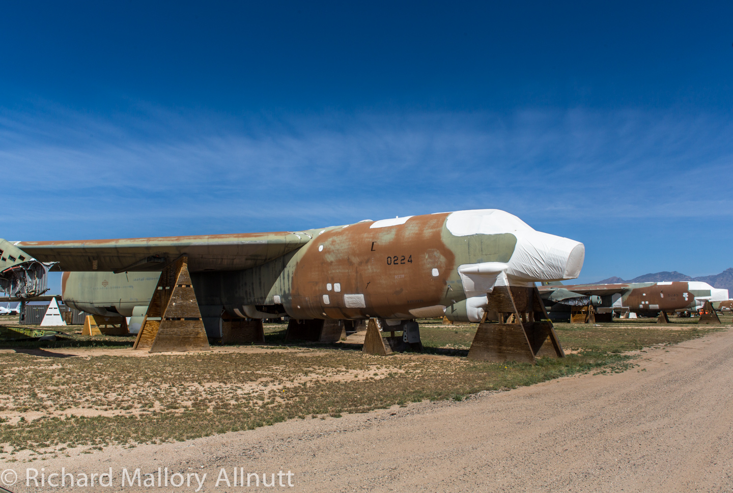 Some of the many chopped up B-52s remaining at AMARG. Even though these aircraft were purposefully rendered irretrievably ground-bound, they still contain many valuable parts to keep the active fleet flying, which is the reason so many are kept beyond the necessary waiting time for the Russians to verify their destruction. (photo by Richard Mallory Allnutt)