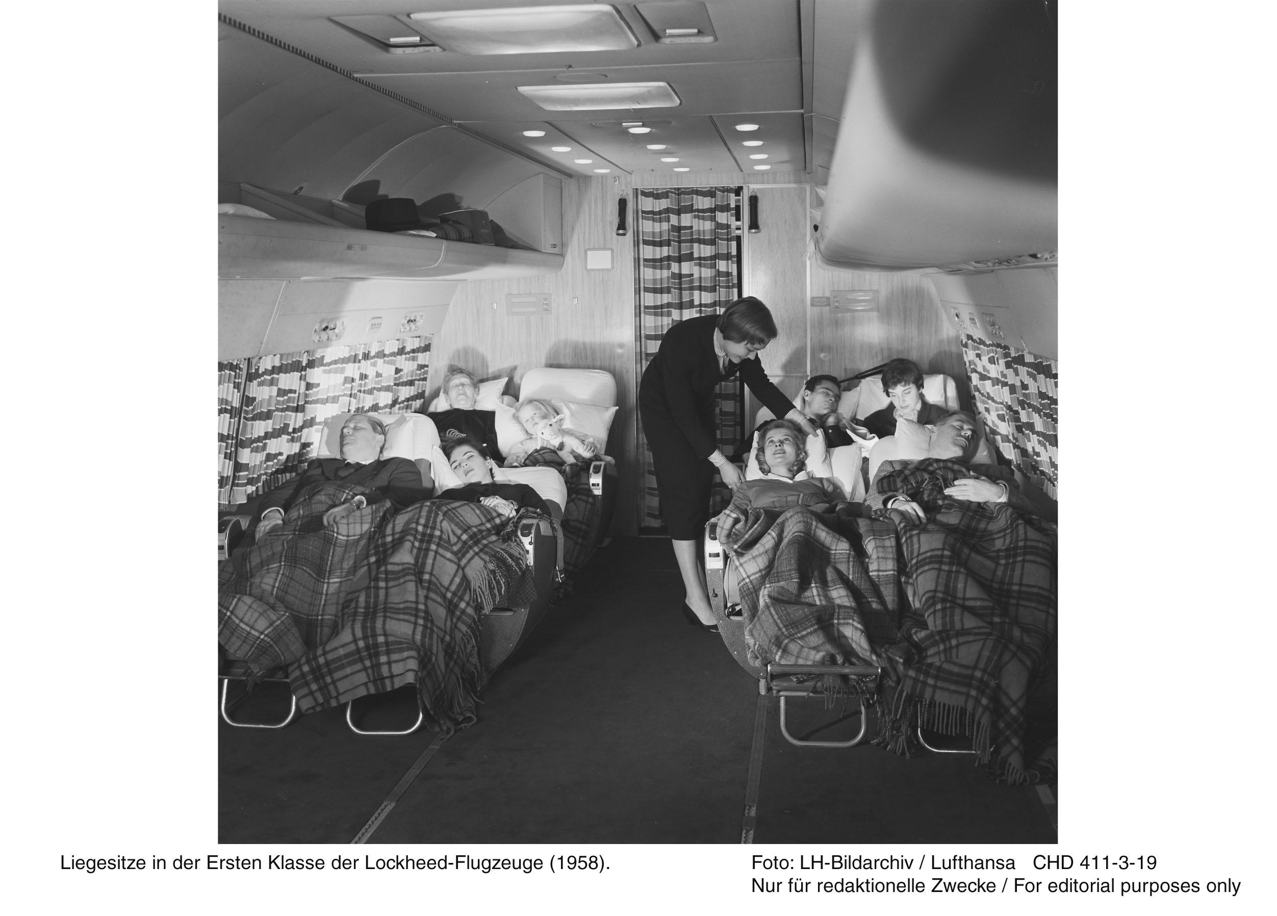 Another view of the 1st class cabin in a Lufthansa Lockheed L-1649A Super Star showing the reclining seats in action. (photo via Wolfgang Borgmann)