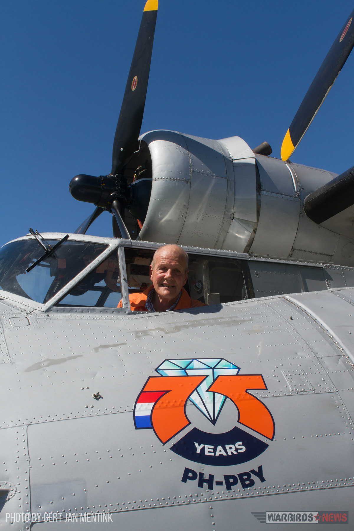 Chief pilot Chris Goezinne in the cockpit of PH-PBY. In 2016, the Catalina Foundation celebrated the aircrafts 75th anniversary, as can be seen on this specially designed logo. It adorned PH-PBYs nose during the 2016 flying season. (photo Gert Jan Mentink)