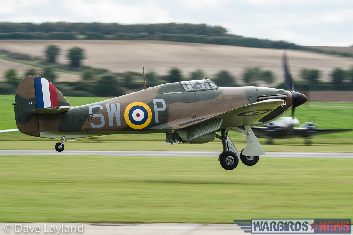 Hurricane Mk.I P3717 of Hurricane Heritage just before she touches down on Duxford's grass runway. (photo by Dave Layland)