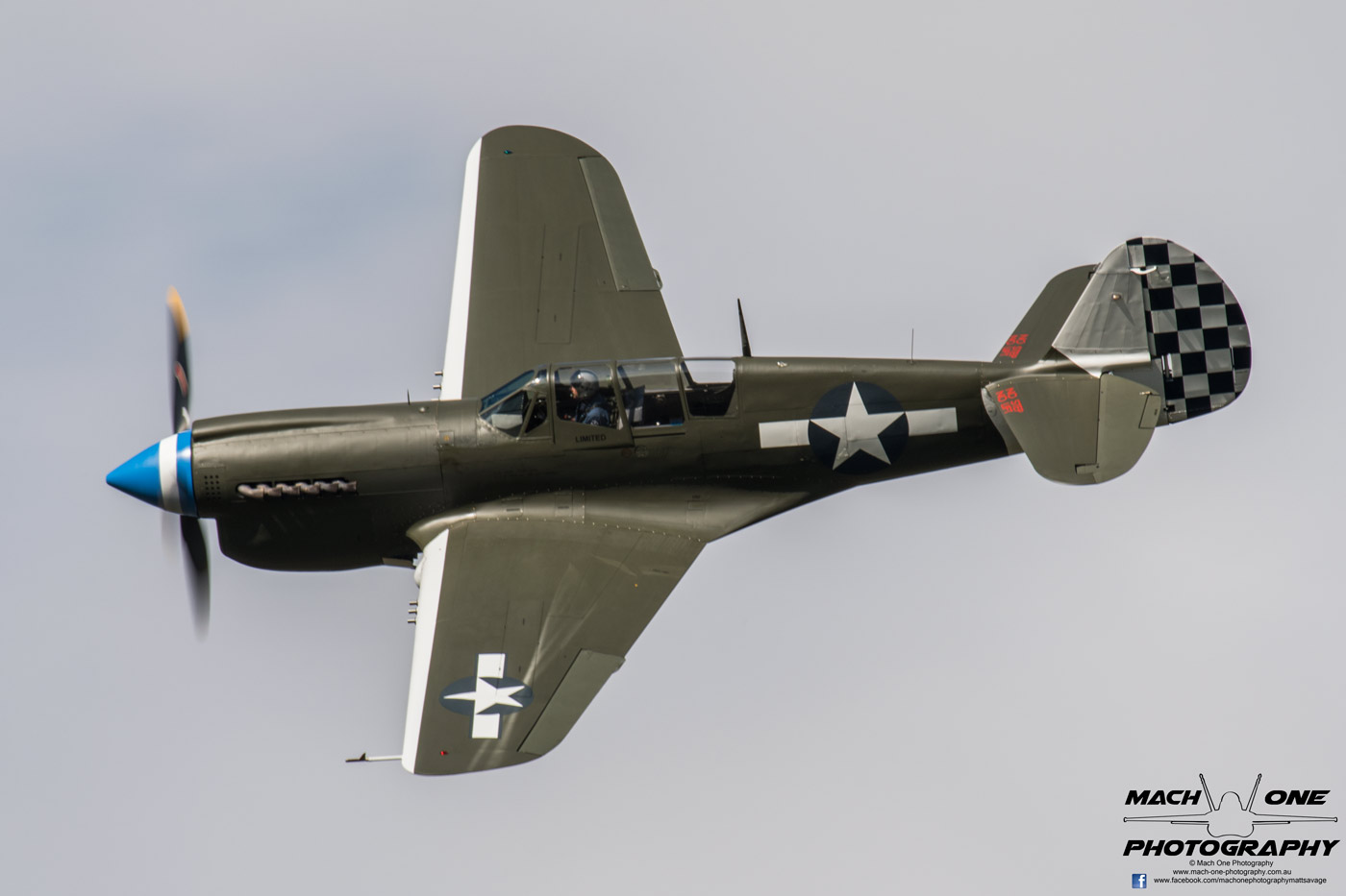 Doug Hamilton's P-40N Warhawk making a topside pass.