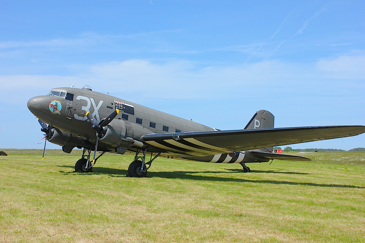 Named "Drag-em-Oot", the UK-based C-53 Skytrooper N473DC (42-100882) from the Lincs Aviation Museum in the UK (East Kirkby where the Panten Bros Lancaster is based). This aircraft was delivered to the USAAF in December 1943 and assigned to the 9th Air Force Troop Carrier Command and then the 87th TCS at Greenham Common. One of its tasks was to recover troop carrying gliders after they'd landed in Normandy and return them to the UK for refurbishment. It was later transferred to Netheravon, Wiltshire and helped with preparations for Operation Market garden (Arnhem). It went to Canada with RCAF from 1946 to 1966 and then became CF-KAZ flying with Trans Provincial Airways and Pacific Coastal Airlines. In the US then as N5831B 1985-2005 and in May 2005 ferried 5500 miles from Arizona to Liverpool (UK) in 34.5 hours becoming N437DC in 2006. Now in 87th Squadron USAAF D-Day colours. ( Photo by Geoff Jones) 