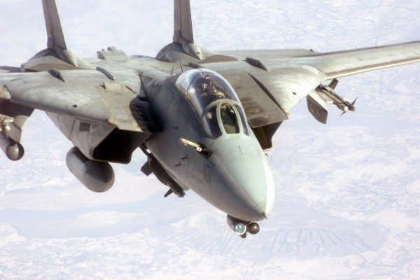 A U.S. Navy F-14D Tomcat flies up with its refueling probe out preparing to connect with a tanker. The F-14 is armed with two AIM 9 Sidewinder missiles, a Paveway II Laser Guided GBU-10 2,000-pound bomb, and LANTIRN Pod, as it prepares for a bombing mission over Afghanistan in support of Operation ENDURING FREEDOM.(Image credit SSGT MICHAEL D. GADDIS, USAF)