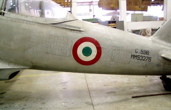 Fiat G.59 MM 53276 at the Italian Air Force Museum restoration hangar showing the locations on its fuselage skin where previous squadron markings lie hidden beneath the 1960s applied paint. (Italian Air Force Museum photo)