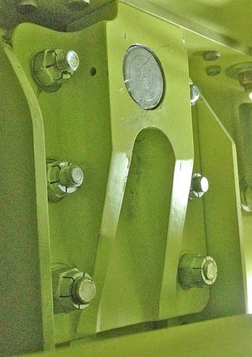 One of the twenty fuselage-to-center section attach fittings. Note the large NASA bolt in the center. (photo via Tom Reilly)