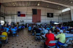 Aviation legends gathered inside the hangar.