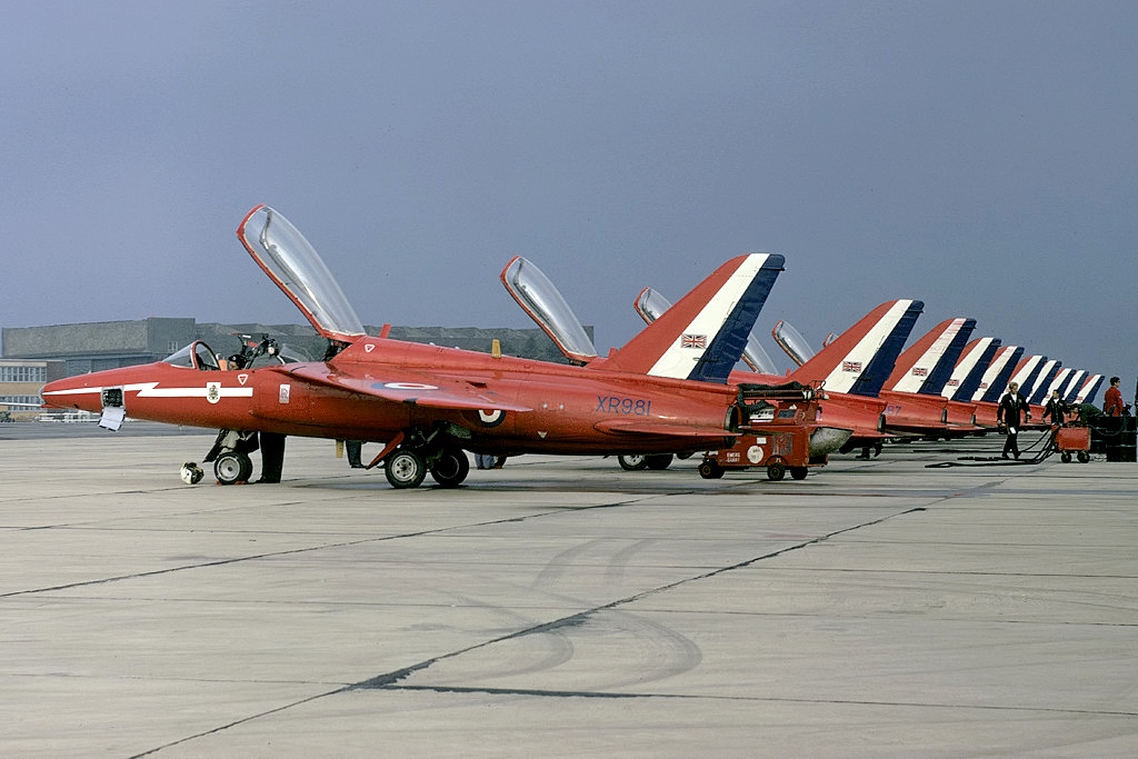 The Hawker Siddeley Gnats of the Red Arrows; seen here at RAF Kemble in 1973. (photo via Wikipedia)