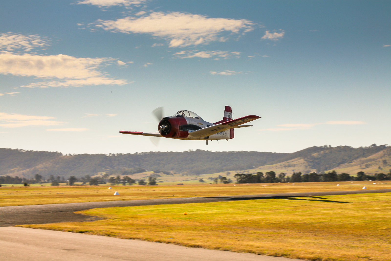 Paul Bennet Airshows' T-28 Trojan on takeoff. (photo by Phil Buckley)