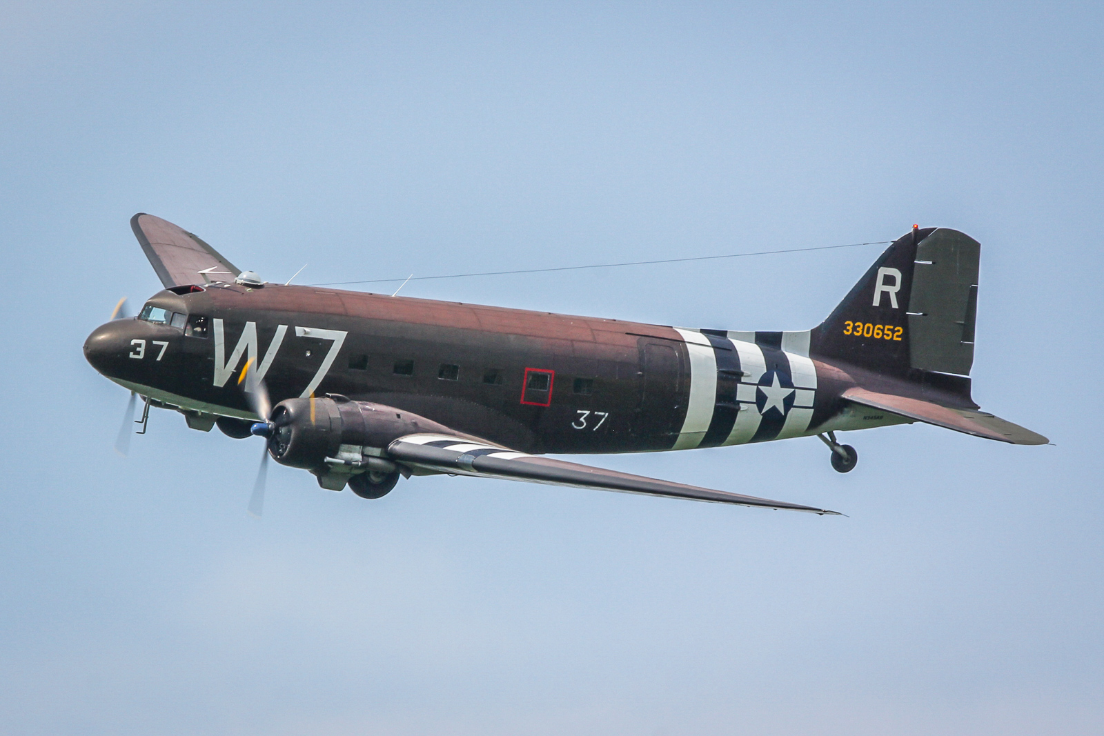 The National Warplane Museum's C-47 'Whiskey 7' flown by Chris Polhemus and John Lindsay. (photo by Tom Pawlesh)