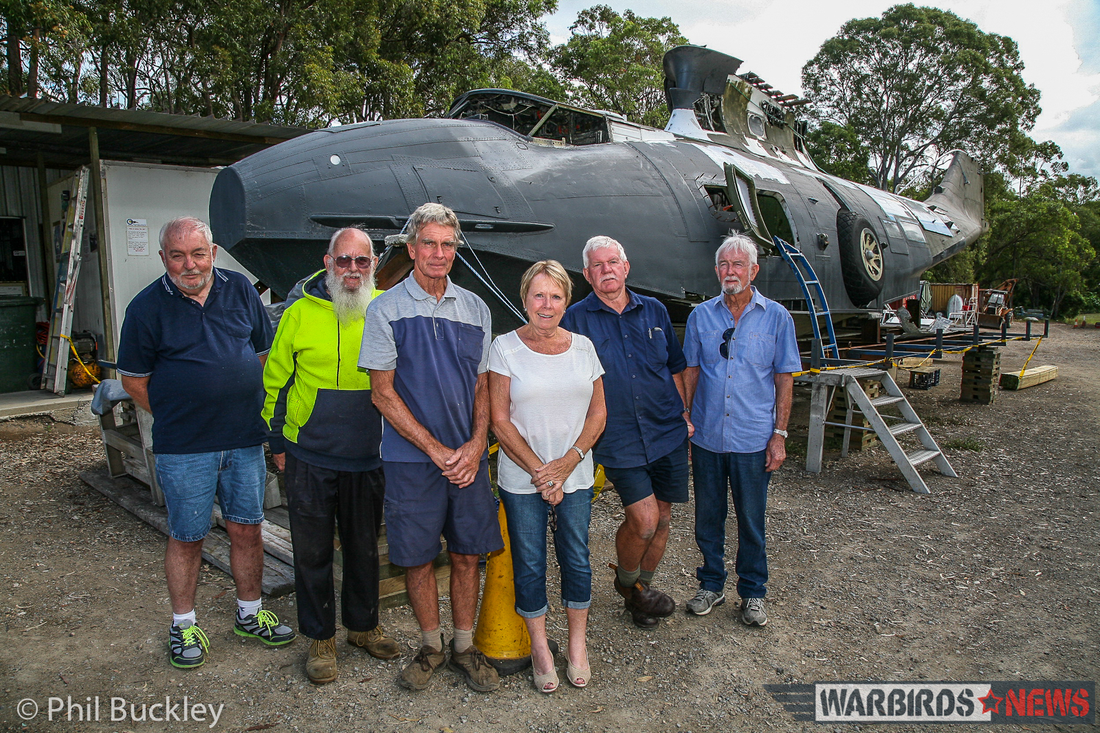 Some of the team involved with restoring the Catalina. (photo by Phil Buckley)