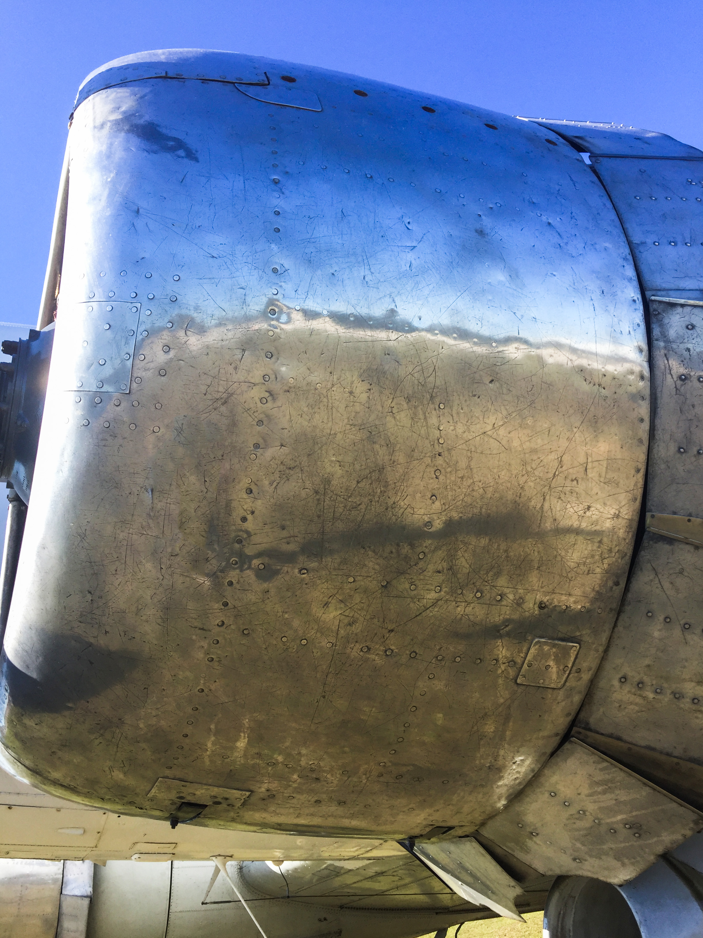 Dieter Canje took the texture and details in his photograph of a worn and well loved DC-3 engine cowling and used it to create an authentic vintage aircraft skin look to the SkyCart trolleys. The results were highly effective!