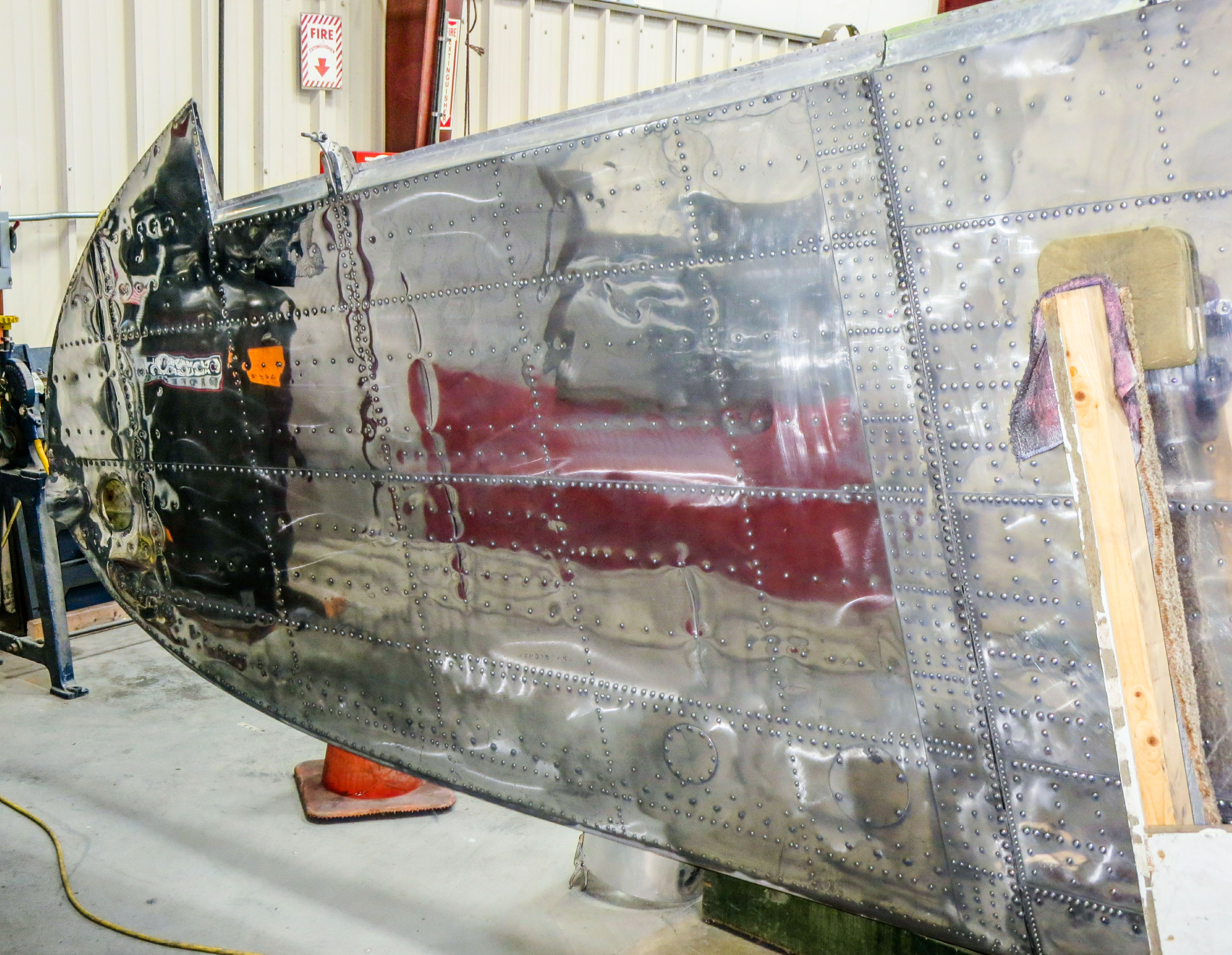 A view of the port wing tip following polishing which shows how well the efforts are progressing. (photo via NEAM)