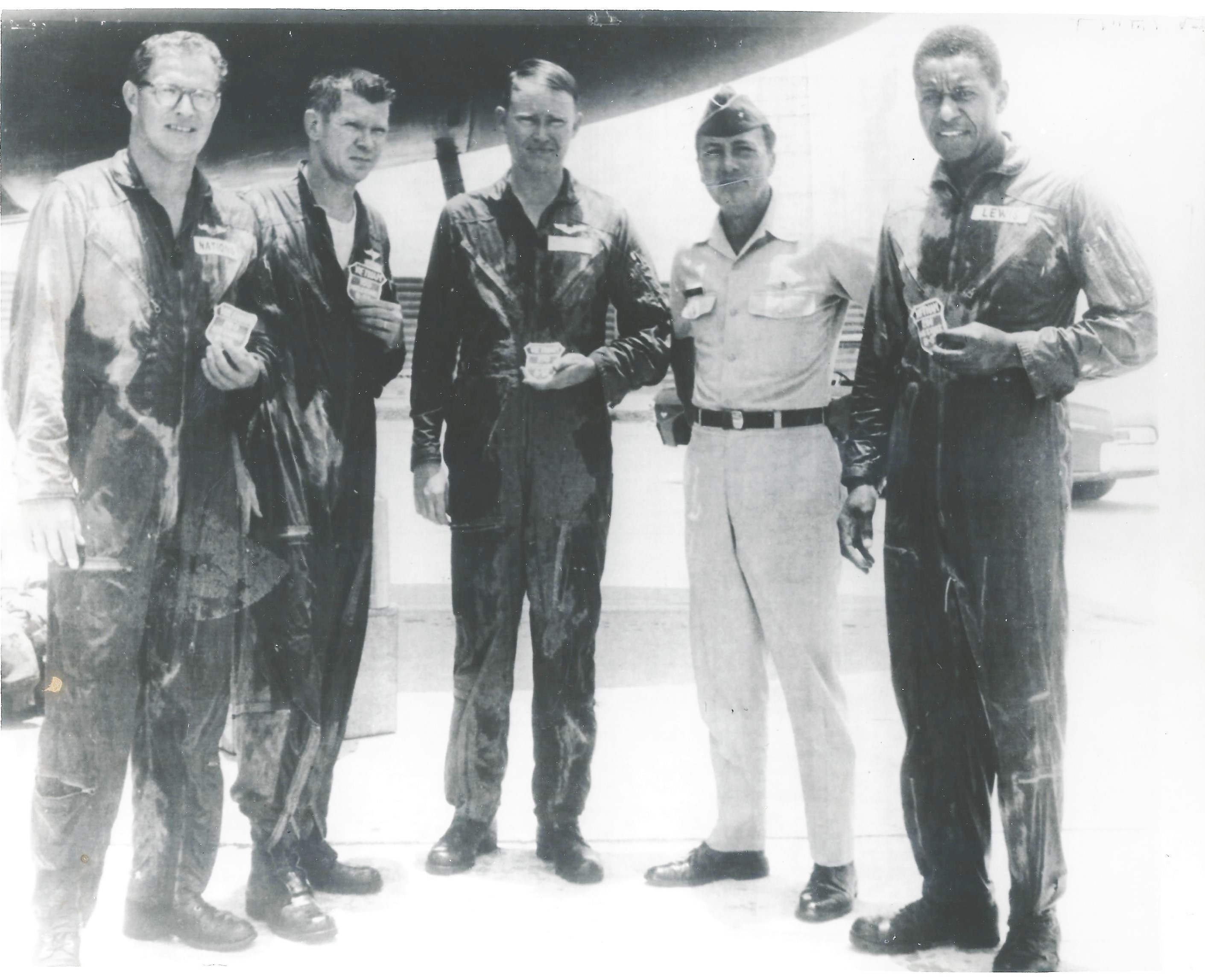 Major Lewix, first from the right, with his crew after completing 200 combat missions in Vietnam ( photo via Peter Macca)