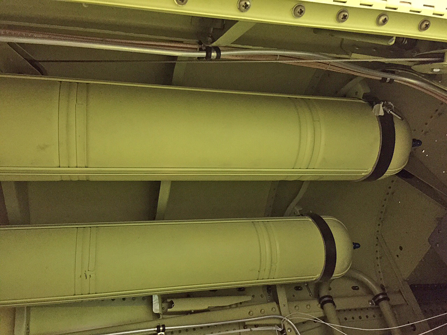 Two small oxygen bottles are mounted in the top forward section of each rear fuselage. (photo via Tom Reilly)