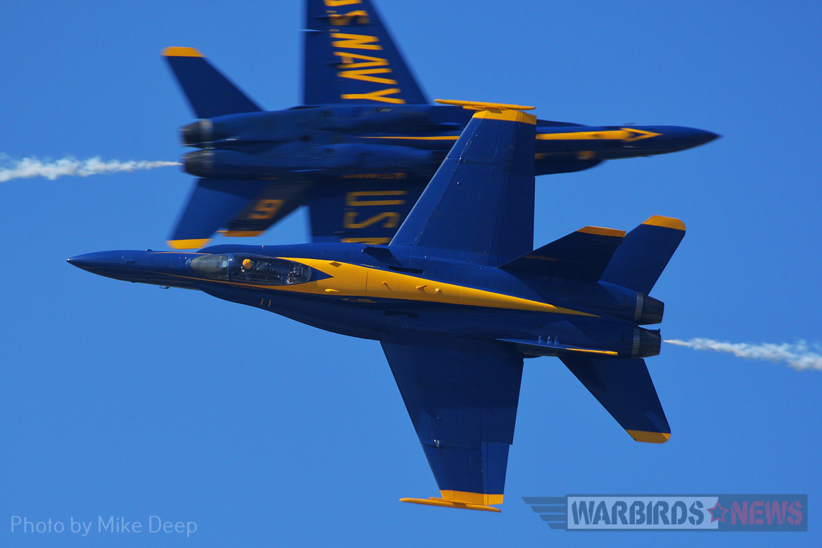 The Blue Angels perform an opposing knife-edge pass on Saturday. Though they were billed as a weekend performer, the Blue Angels flew practice demonstrations on Thursday and Friday. 