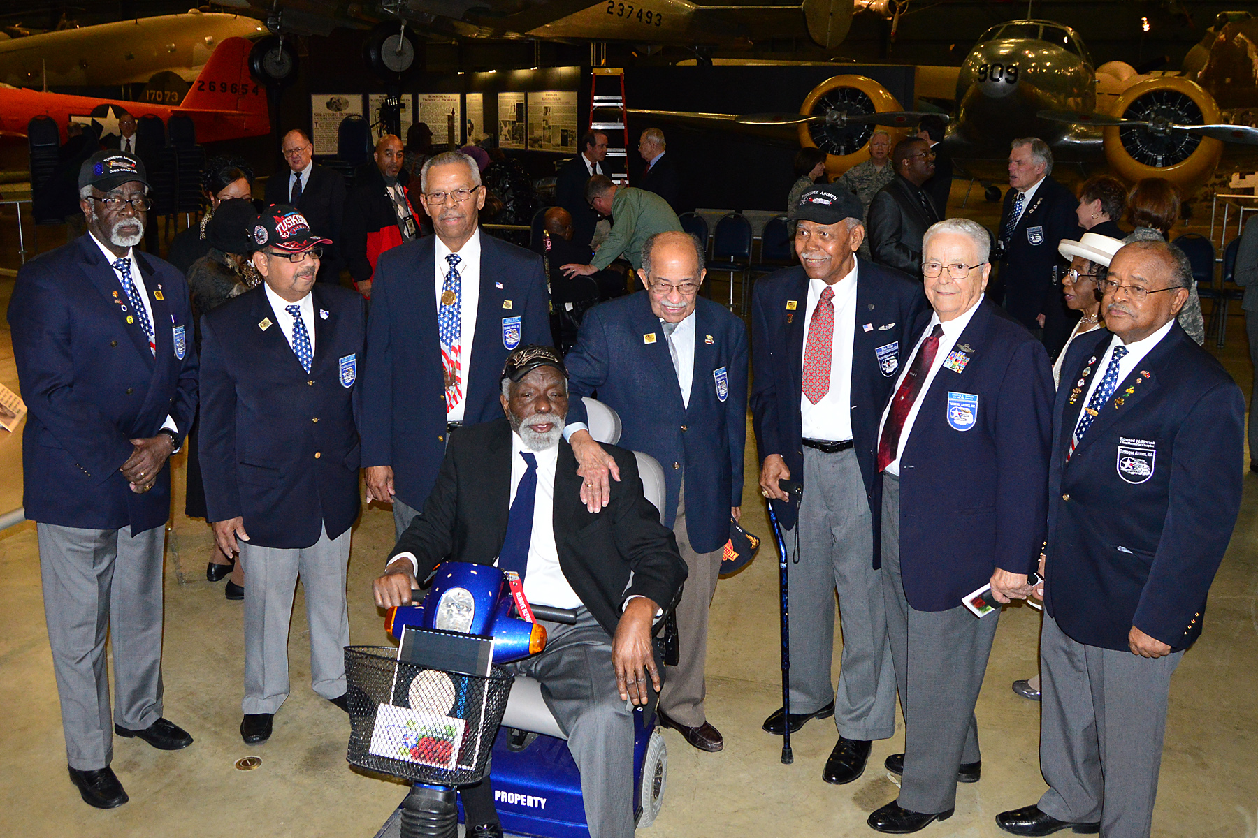Tuskegee Airmen and Honorary Tuskegee Airmen gathered for photographs at the expanded Tuskegee Airmen exhibit opening in the WWII Gallery at the National Museum of the U.S. Air Force on Feb. 10, 2015. (U.S. Air Force photo) 