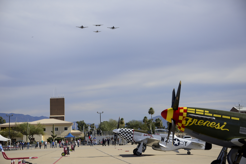 Two U.S. Air Force A-10C Thunderbolt II's, a P-38 Lightning and a P-47 Thunderbolt fly in formation over viewers during the 2017 Heritage Flight Training and Certification Course at Davis-Monthan Air Force Base, Ariz., Feb. 12, 2017. Established in 1997, the HFTCC certifies civilian pilots of historic military aircraft and U.S. Air Force pilots to fly in formation together during the upcoming air show season. (U.S. Air Force photo by Senior Airman Betty R. Chevalier)