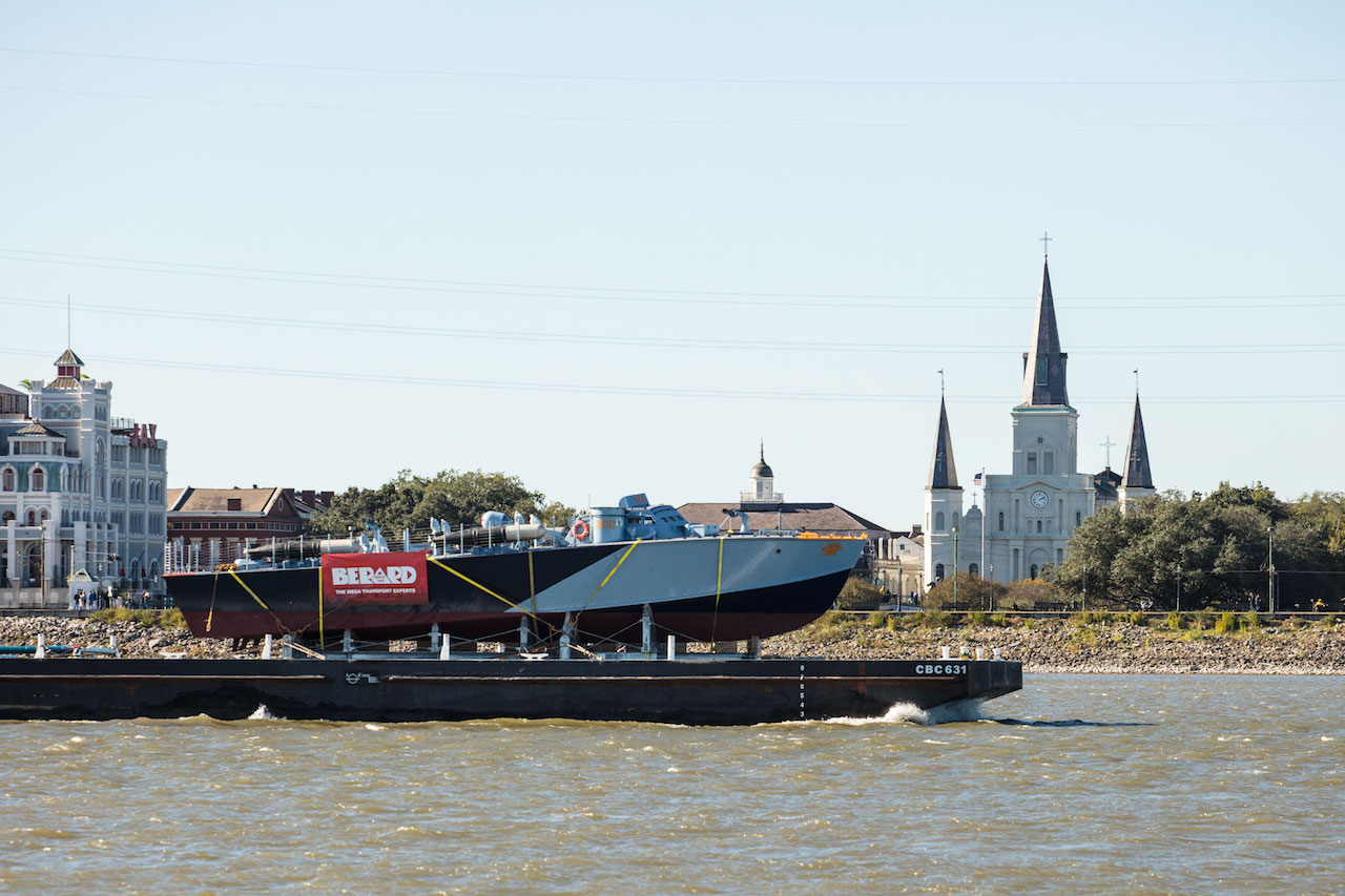 PT-305 is transported by barge on the Mississippi River to begin sea trails at Seabrook Marine & Harbor.