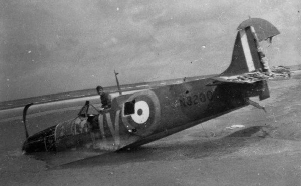 Spitfire Mk.Ia N3200 sitting in the waves on the beach at Sangatte after being shot down on May 26th, 1940. (photo via Global Aviation Resource)