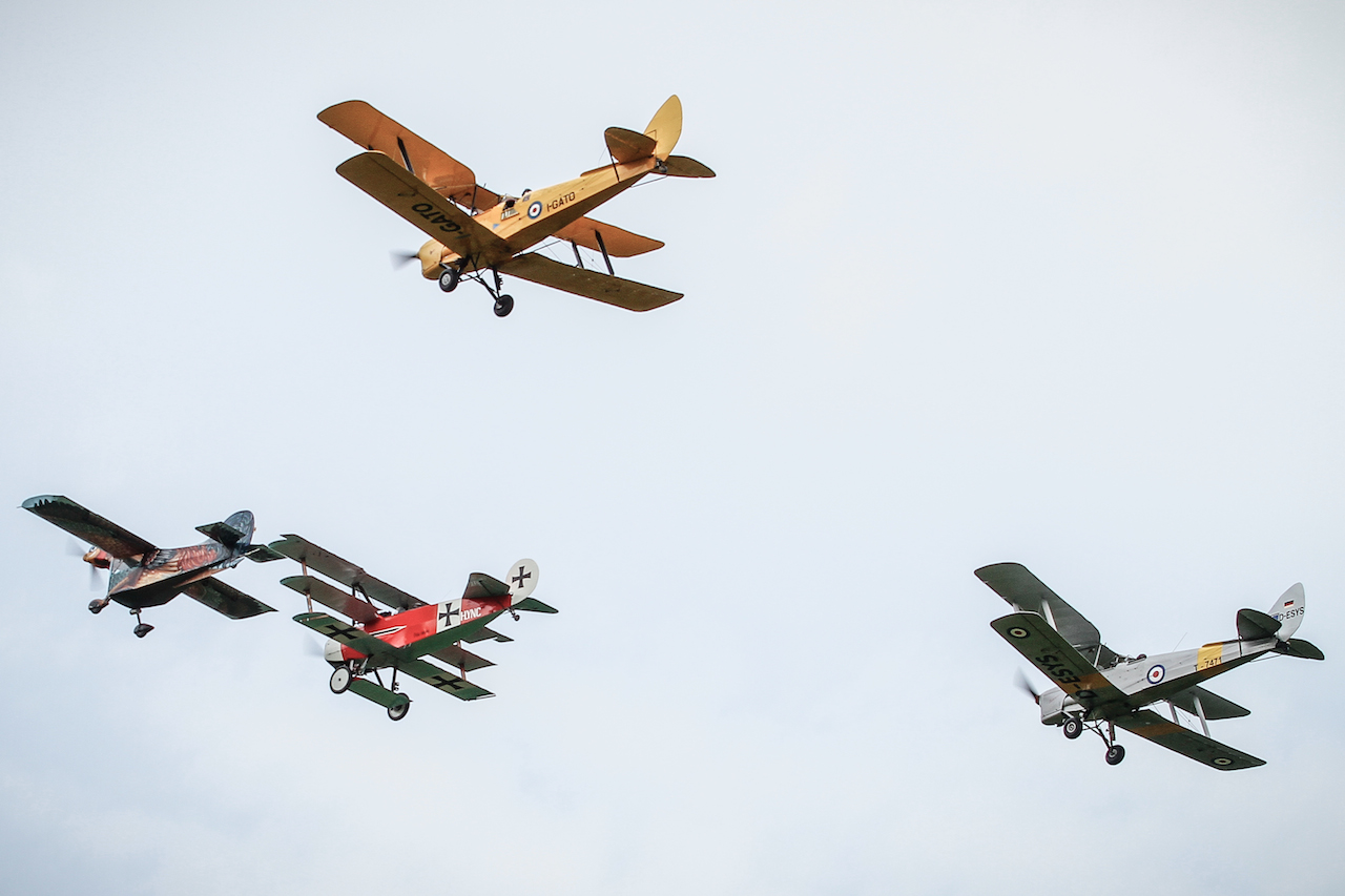 The world renowned AEROGALLO (Flying Rooster ) in formation with the Fokker and two Tiger moth. 