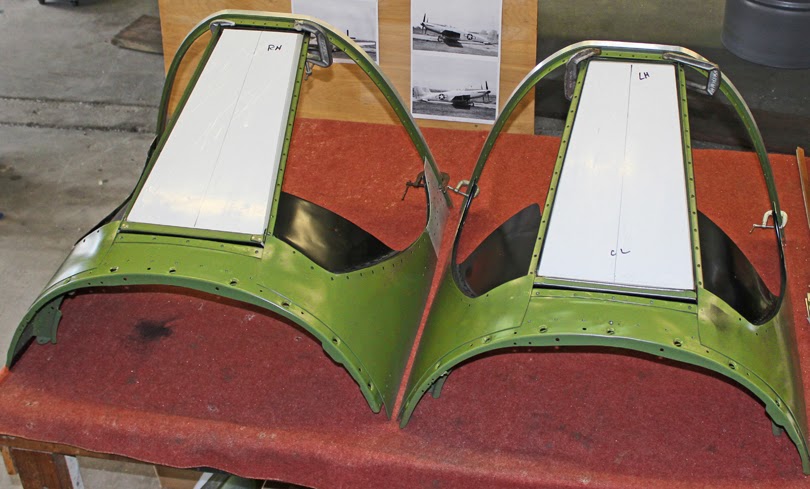 The two completed windshield assemblies and minus the glass side panels.