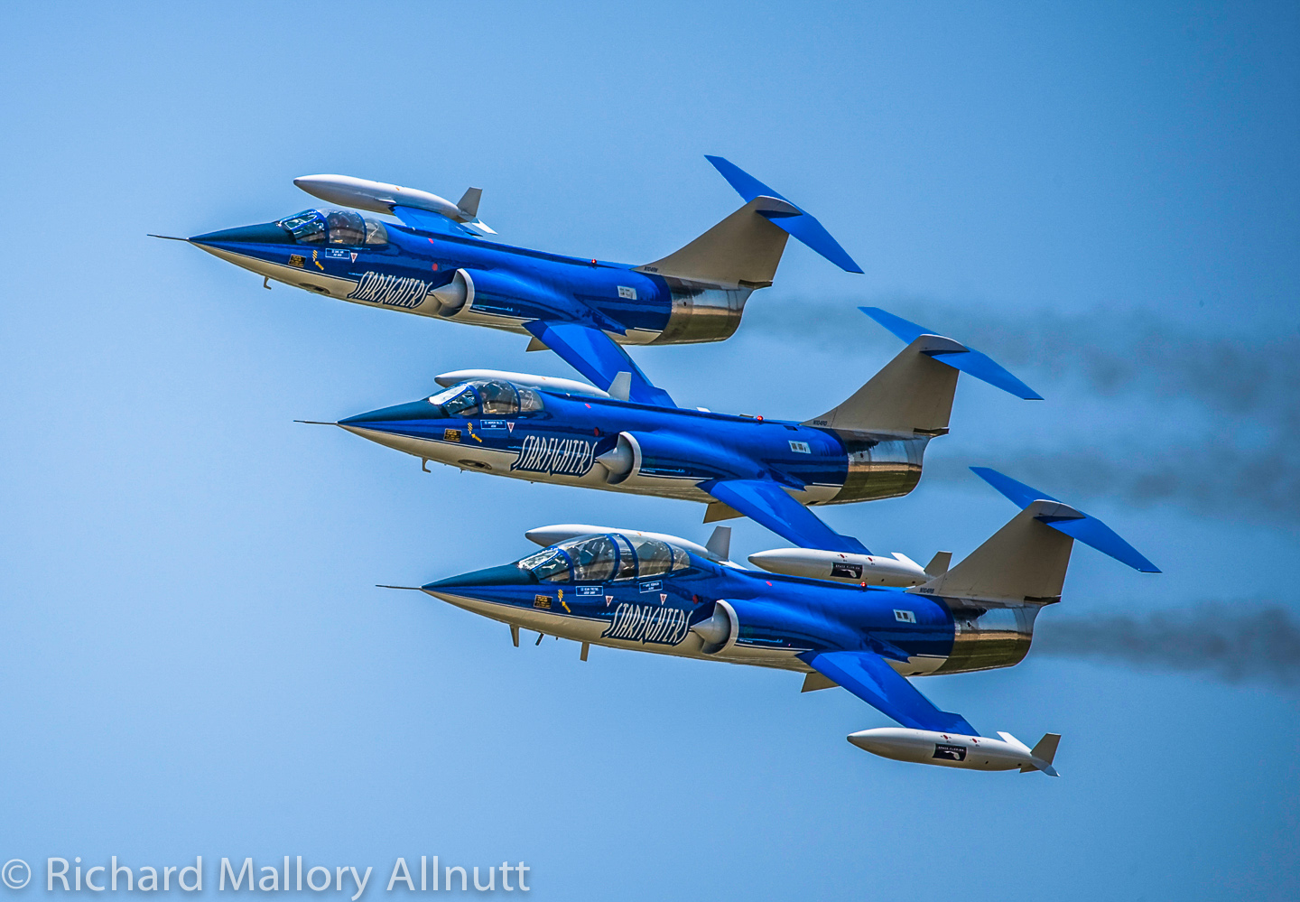 Three of the company's CF-104 Starfighters tucked into tight formation at Joint Base Andrews in Clinton, Maryland during the now biannual air show. (photo by Richard Mallory Allnutt) 